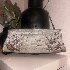 Silver clutch/ embroidered details